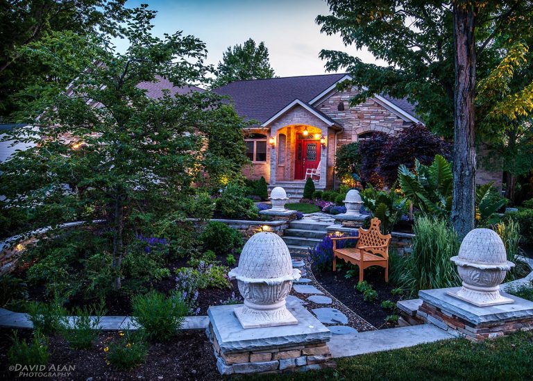 outdoor garden with intricate sculptures designed by The Bremec Group